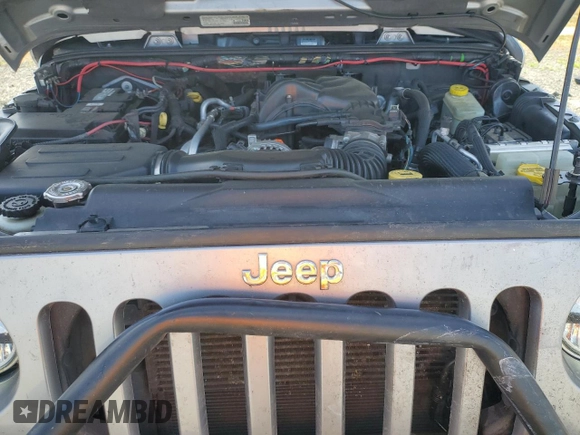 2014 Jeep Wrangler Unlimited Sahara with VIN 1C4HJWEG1EL126611, listed as a Copart auction lot 57169485 with 122,000 mi miles and Salvage title. Bid and sale history available at DreamBid. Image 11.