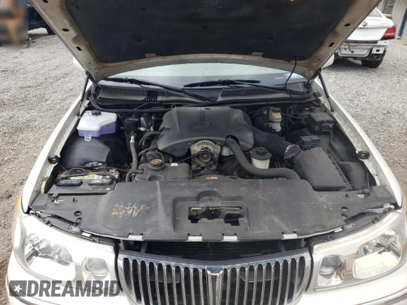 2001 Lincoln Town Car Cartier L z VIN 1LNHM85W11Y610538, wystawiony jako Copart lot #47881055 z przebiegiem 139 032 mil mil oraz Szkoda całkowita • Salvage title. Historia ofert i sprzedaży dostępna na DreamBid. Obrazek 11.