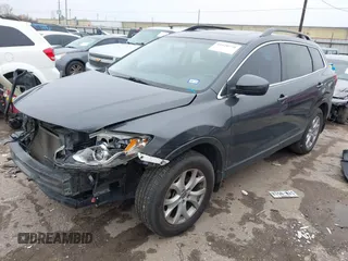 2014 Mazda CX-9 Touring with VIN JM3TB2CA1E0427984, listed as a IAAI auction lot 41620770 with 88,305 mi miles and . Bid and sale history available at DreamBid. Image 2.