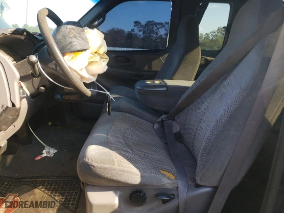 1999 Ford F-150 Work Series with VIN 2FTZX1724XCA24935, listed as a Copart auction lot 72449634 with 349,855 mi miles and Salvage Title. Bid and sale history available at carsss.com. Image 7.