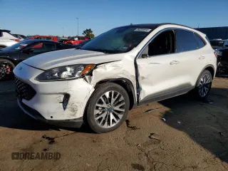 2020 Ford Escape Titanium Hybrid с VIN 1FMCU0DZ5LUA54462, выставлен на аукционе Copart как лот 76230694 с пробегом 32 698 миль миль и Списание • Salvage title. История ставок и продаж доступна на DreamBid. Изображение 1.