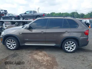 2012 BMW X5 35i with VIN 5UXZV4C59CL766849, listed as a IAAI auction lot 42749836 with 179,273 mi miles and . Bid and sale history available at DreamBid. Image 14.