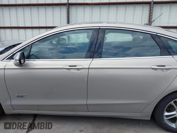 2015 Ford Fusion Energi Titanium with VIN 3FA6P0SU3FR114739, listed as a IAAI auction lot 42003011 with 120,553 mi miles. Bid and sale history available at carsss.com. Image 14.