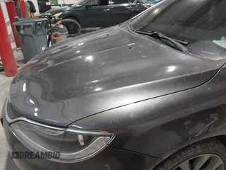 2015 Chrysler 200 C with VIN 1C3CCCCG1FN551259, listed as a IAAI auction lot 41221979 with 98,055 mi miles and . Bid and sale history available at carsss.com. Image 6.