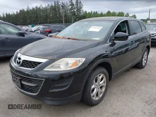 2011 Mazda CX-9 Touring with VIN JM3TB3CV0B0331123, listed as a IAAI auction lot 42260158 with 130,411 mi miles and . Bid and sale history available at DreamBid. Image 2.