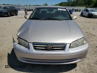 2001 Toyota Camry LE z VIN 4T1BF28K71U958213, wystawiony jako Copart lot #53208995 z przebiegiem 321 617 mil mil oraz Szkoda całkowita • Salvage title. Historia ofert i sprzedaży dostępna na DreamBid. Obrazek 5.