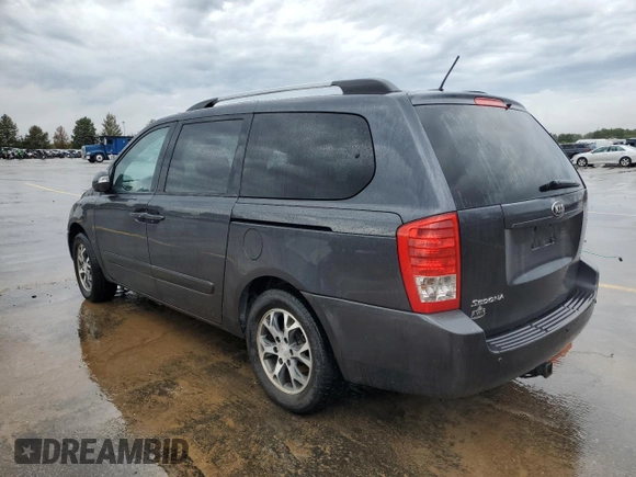 2014 Kia Sedona LX with VIN KNDMG4C77E6539099, listed as a Copart auction lot 72695234 with 86,979 mi miles and Salvage Title. Bid and sale history available at carsss.com. Image 2.