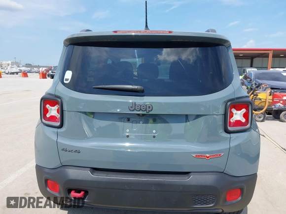 2015 Jeep Renegade Trailhawk with VIN ZACCJBCT8FPB33586, listed as a IAAI auction lot 42590207 with 127,168 mi miles and . Bid and sale history available at DreamBid. Image 16.
