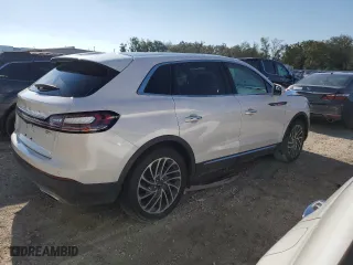 2019 Lincoln Nautilus Reserve with VIN 2LMPJ6LPXKBL21200, listed as a Copart auction lot 85203634 with 60,728 mi miles and Salvage Title. Bid and sale history available at carsss.com. Image 3.