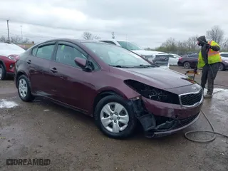2017 Kia Forte LX with VIN 3KPFK4A75HE059720, listed as a IAAI auction lot 41892406 with 97,327 mi miles. Bid and sale history available at carsss.com. Image 1.