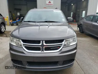 2016 Dodge Journey American Value with VIN 3C4PDCAB8GT138354, listed as a Copart auction lot 52383675 with 142,174 mi miles and Salvage Title. Bid and sale history available at DreamBid. Image 5.