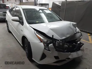 2016 Toyota Prius Two with VIN JTDKBRFU3G3513060, listed as a IAAI auction lot 41789034 with 153,391 mi miles and . Bid and sale history available at DreamBid. Image 1.
