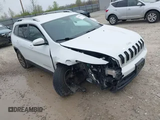 2014 Jeep Cherokee Latitude with VIN 1C4PJMCSXEW150735, listed as a IAAI auction lot 42020944 with 76,303 mi miles and . Bid and sale history available at carsss.com. Image 1.