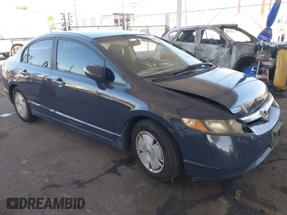 2007 Honda Civic z VIN JHMFA36217S017274, wystawiony jako IAAI lot #41871225 z przebiegiem 142 253 mil mil oraz . Historia ofert i sprzedaży dostępna na DreamBid. Obrazek 1.