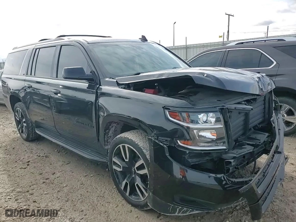 2019 Chevrolet Suburban LT with VIN 1GNSKHKC5KR291660, listed as a Copart auction lot 51587645 with 107,786 mi miles and Salvage Title. Bid and sale history available at carsss.com. Image 12.
