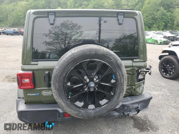 2023 Jeep Wrangler Sahara z VIN 1C4JJXP62PW553101, wystawiony jako Copart lot #56935165 z przebiegiem 28 157 mil mil oraz Szkoda całkowita • Salvage title. Historia ofert i sprzedaży dostępna na DreamBid. Obrazek 6.