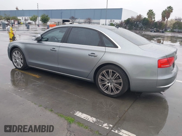 2012 Audi A8 z VIN WAURVAFD5CN008320, wystawiony jako IAAI lot #41508237 z przebiegiem 183 398 mil mil oraz . Historia ofert i sprzedaży dostępna na DreamBid. Obrazek 3.