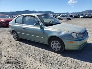 2003 Hyundai Accent GL with VIN KMHCG35C83U257641, listed as a Copart auction lot 73421464 with 143,814 mi miles and Clean Title. Bid and sale history available at carsss.com. Image 4.