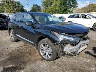 2023 Acura RDX w/Technology Package with VIN 5J8TC1H56PL003439, listed as a Copart auction lot 73194684 with 33,476 mi miles and Salvage Title. Bid and sale history available at carsss.com. Image 4.