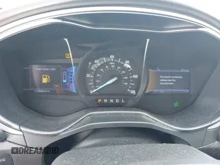 2013 Ford Fusion SE Hybrid z VIN 3FA6P0LUXDR181849, wystawiony jako IAAI lot #41949276 z przebiegiem 112 688 mil mil oraz . Historia ofert i sprzedaży dostępna na DreamBid. Obrazek 7.