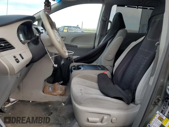 2014 Toyota Sienna LE with VIN 5TDJK3DC4ES085384, listed as a Copart auction lot 60375125 with 81,696 mi miles and Salvage title. Bid and sale history available at DreamBid. Image 7.