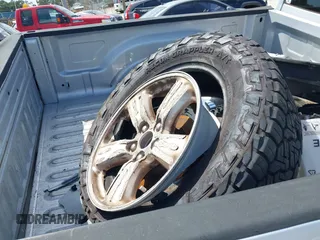 2014 Ram 1500 SLT z VIN 1C6RR6GT9ES477819, wystawiony jako IAAI lot #42358824 z przebiegiem 145 044 mil mil oraz . Historia ofert i sprzedaży dostępna na DreamBid. Obrazek 12.