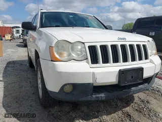 2010 Jeep Grand Cherokee Laredo with VIN 1J4PR4GK0AC151711, listed as a IAAI auction lot 41940295 with 185,684 mi miles. Bid and sale history available at carsss.com. Image 6.