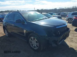 2015 Cadillac SRX with VIN 3GYFNAE35FS608595, listed as a IAAI auction lot 41282751 with 127,055 mi miles and . Bid and sale history available at DreamBid. Image 1.