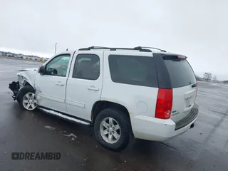2011 GMC Yukon SLT with VIN 1GKS2CE03BR118690, listed as a IAAI auction lot 41941840 with 243,311 mi miles and . Bid and sale history available at DreamBid. Image 3.