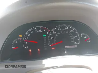 2005 Toyota Camry LE z VIN 4T1BE30K65U592500, wystawiony jako IAAI lot #42373718 z przebiegiem 189 054 mil mil oraz . Historia ofert i sprzedaży dostępna na DreamBid. Obrazek 7.