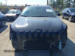 2015 Jeep Cherokee North with VIN 1C4PJMCS3FW777973, listed as a IAAI auction lot 42043203 with 158,536 mi miles. Bid and sale history available at carsss.com. Image 13.