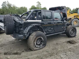 2023 Jeep Wrangler Rubicon with VIN 1C4HJXFN9PW507594, listed as a Copart auction lot 73111214 with Not provided miles and Salvage title. Bid and sale history available at DreamBid. Image 3.