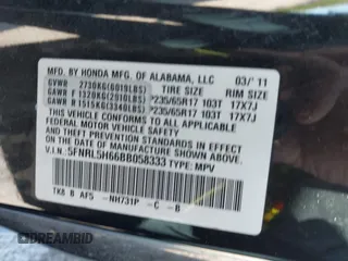 2011 Honda Odyssey EX-L with VIN 5FNRL5H66BB058333, listed as a IAAI auction lot 42172045 with 215,723 mi miles and . Bid and sale history available at carsss.com. Image 9.