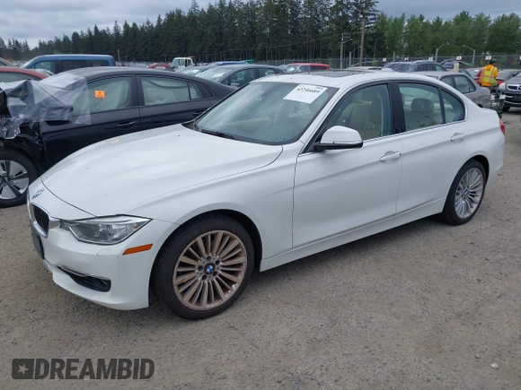 2012 BMW 3 Series 328i with VIN WBA3A5C56CF340427, listed as a IAAI auction lot 42246689 with 149,419 mi miles and . Bid and sale history available at DreamBid. Image 2.