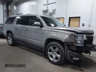 2018 Chevrolet Suburban Premier z VIN 1GNSKJKC9JR100134, wystawiony jako IAAI lot #41449255 z przebiegiem 111 528 mil mil oraz . Historia ofert i sprzedaży dostępna na DreamBid. Obrazek 1.