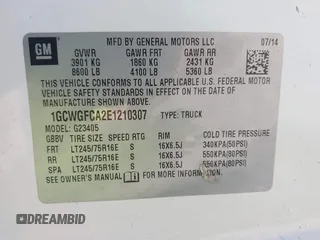 2014 Chevrolet Express Cargo Van with VIN 1GCWGFCA2E1210307, listed as a IAAI auction lot 39559260 with 213,814 mi miles. Bid and sale history available at carsss.com. Image 9.