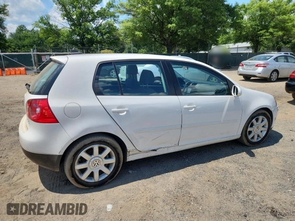 2009 Volkswagen Rabbit S with VIN WVWDB71K79W120196, listed as a Copart auction lot 62126625 with 105,695 mi miles and Salvage title. Bid and sale history available at DreamBid. Image 3.