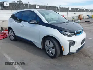 2015 BMW i3 z VIN WBY1Z2C51FV286626, wystawiony jako IAAI lot #41948522 z przebiegiem 106 060 mil mil oraz . Historia ofert i sprzedaży dostępna na DreamBid. Obrazek 1.