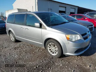 2014 Dodge Grand Caravan SXT 30th Anniversary with VIN 2C4RDGCG3ER253517, listed as a IAAI auction lot 41853737 with 194,476 mi miles and . Bid and sale history available at DreamBid. Image 1.