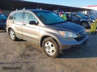 2009 Honda CR-V LX with VIN 5J6RE48389L011915, listed as a IAAI auction lot 41301796 with 214,807 mi miles. Bid and sale history available at carsss.com. Image 1.