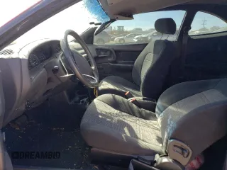 2000 Ford Escort ZX2 with VIN 3FAKP1130YR137847, listed as a Copart auction lot 69797534 with 96,150 mi miles and Salvage Title. Bid and sale history available at carsss.com. Image 7.