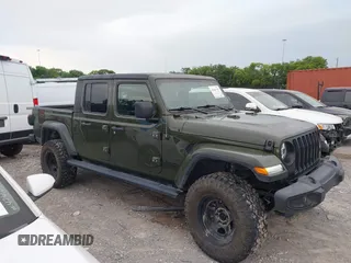 2022 Jeep Gladiator Texas Trail z VIN 1C6HJTAG1NL105124, wystawiony jako IAAI lot #42601707 z przebiegiem 52 064 mil mil oraz . Historia ofert i sprzedaży dostępna na DreamBid. Obrazek 13.