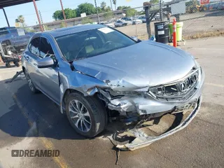 2016 Acura TLX with VIN 19UUB1F38GA002104, listed as a IAAI auction lot 41998966 with 124,159 mi miles. Bid and sale history available at carsss.com. Image 1.