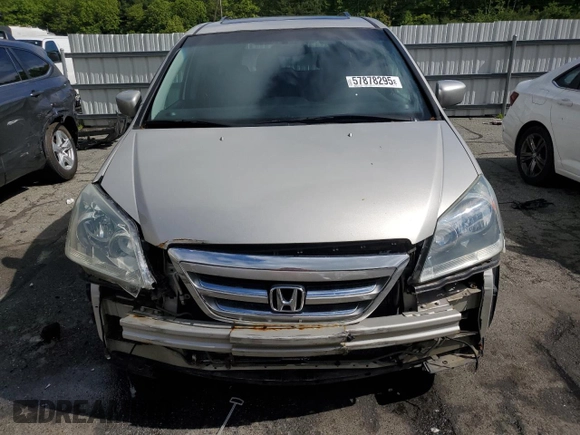 2005 Honda Odyssey Touring z VIN 5FNRL38835B071258, wystawiony jako Copart lot #57878295 z przebiegiem 143 474 mil mil oraz Szkoda całkowita • Salvage title. Historia ofert i sprzedaży dostępna na DreamBid. Obrazek 5.