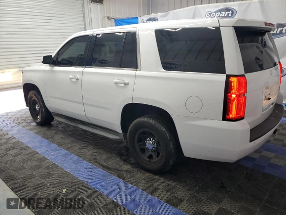 2015 Chevrolet Tahoe Commercial with VIN 1GNLC2ECXFR269024, listed as a Copart auction lot 61911165 with 182,445 mi miles and Clean title. Bid and sale history available at DreamBid. Image 2.