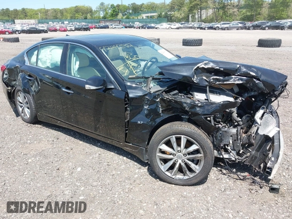 2015 Infiniti Q50 Premium z VIN JN1BV7AR4FM410949, wystawiony jako IAAI lot #42243917 z przebiegiem 56 552 mil mil oraz . Historia ofert i sprzedaży dostępna na DreamBid. Obrazek 1.