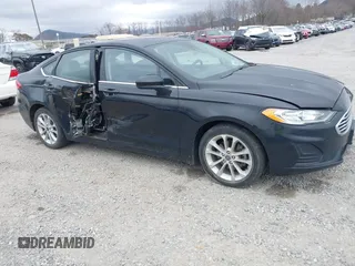 2020 Ford Fusion SE z VIN 3FA6P0LU6LR197254, wystawiony jako IAAI lot #41843588 z przebiegiem 47 874 mil mil oraz . Historia ofert i sprzedaży dostępna na DreamBid. Obrazek 1.