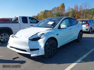 2024 Tesla Model Y with VIN 7SAYGDED8RA331778, listed as a IAAI auction lot 40716650 with NaN miles. Bid and sale history available at carsss.com. Image 17.