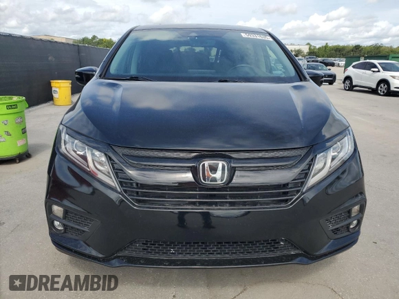 2018 Honda Odyssey EX-L z VIN 5FNRL6H7XJB031245, wystawiony jako Copart lot #59331635 z przebiegiem 74 901 mil mil oraz Czysty tytuł • Clean title. Historia ofert i sprzedaży dostępna na DreamBid. Obrazek 5.