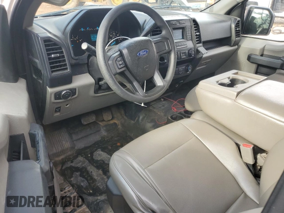 2017 Ford F-150 XL с VIN 1FTMF1C89HFC37988, выставлен на аукционе Copart как лот 62654895 с пробегом 107 035 миль миль и Списание • Salvage title. История ставок и продаж доступна на DreamBid. Изображение 8.